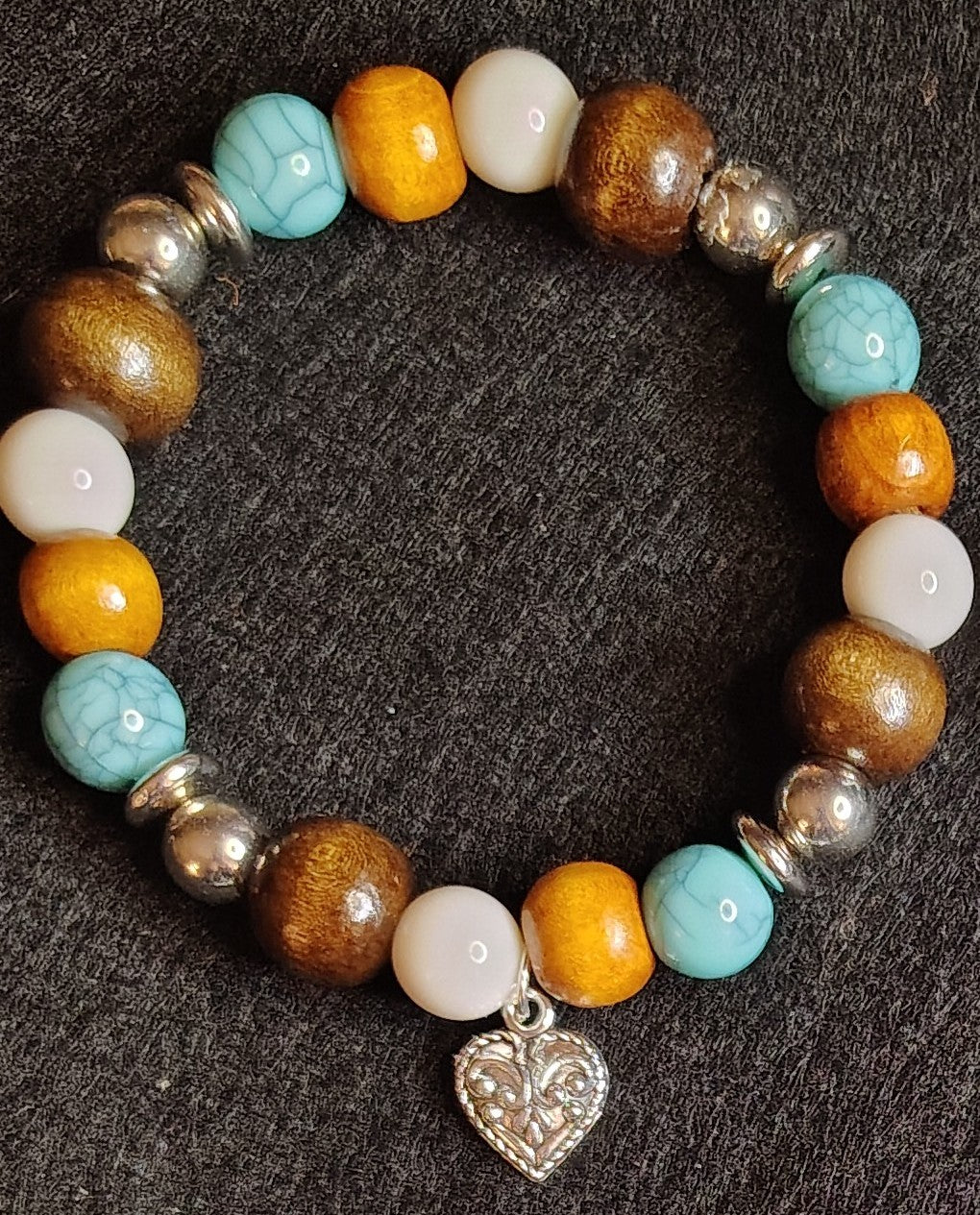 Handmade stretchy bracelet, turquoise, white, wood and silver with heart charm