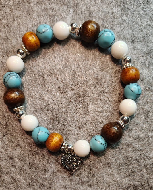 Handmade stretchy bracelet, turquoise, white, wood, silver beads. Silver heart charm