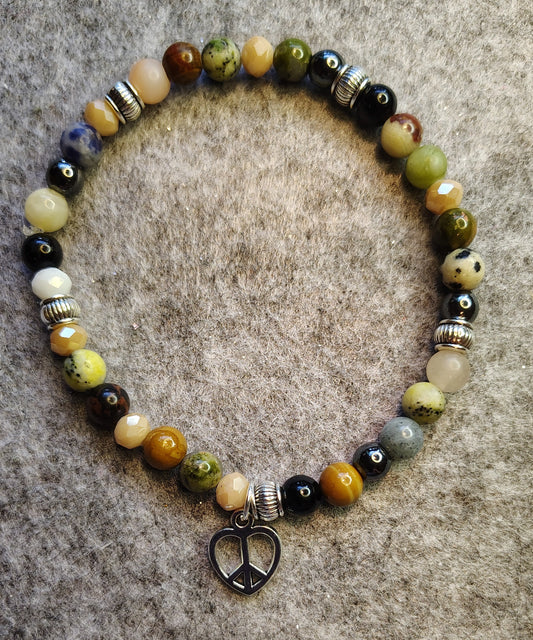 Handmade stretchy bracelet, earthtone with silver peace sign/heart